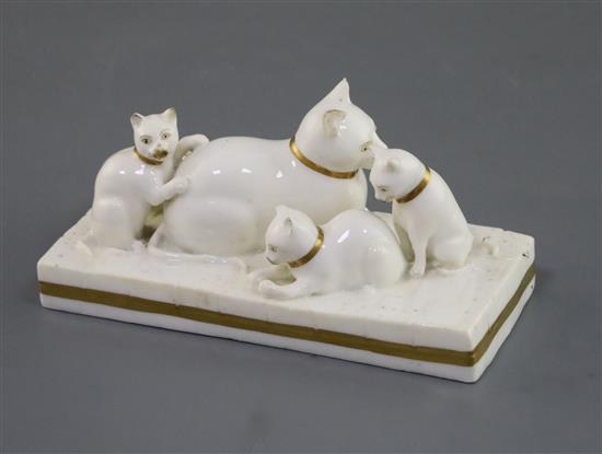 A Rockingham porcelain group of a cat and three kittens, c.1830, L. 11.2cm